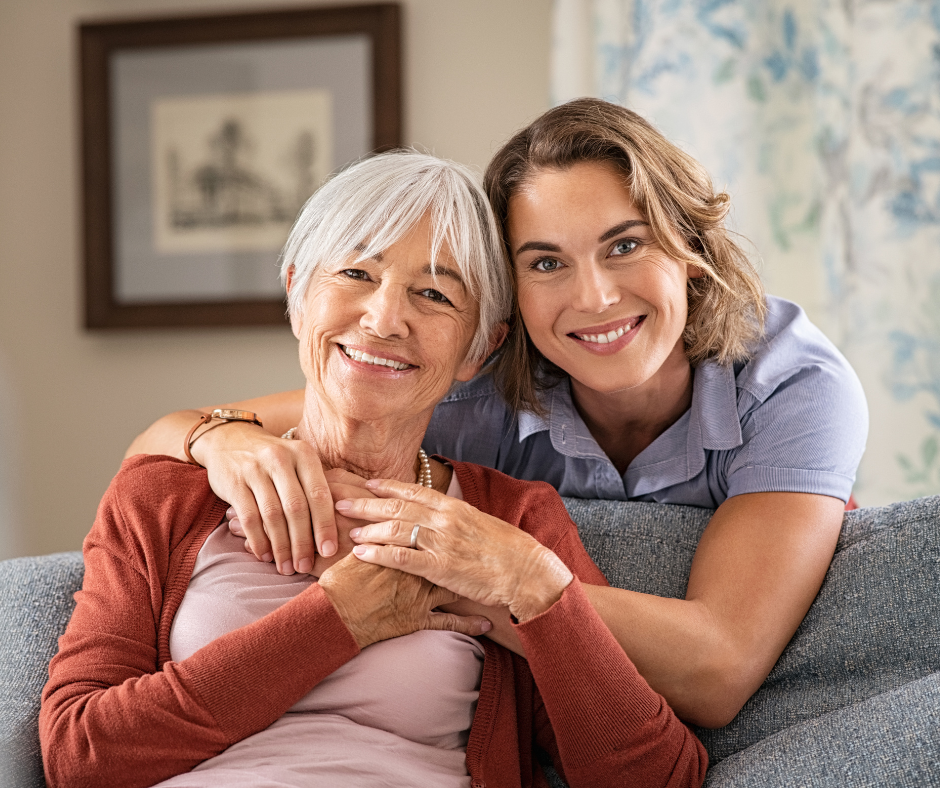 Smiling senior with daughter